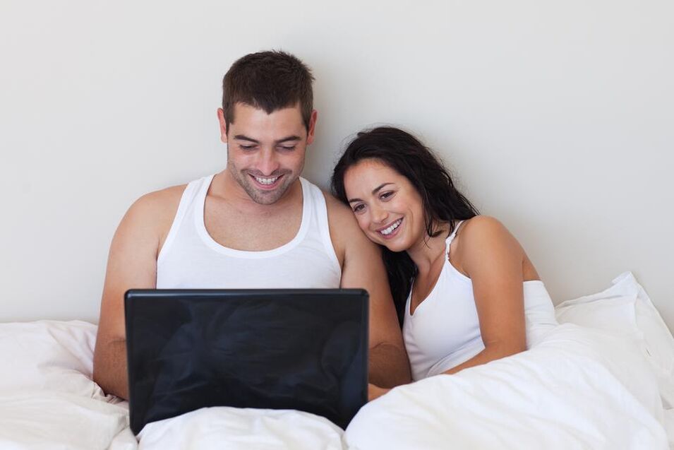 Young couples read reviews about the use of external drugs for penis enlargement